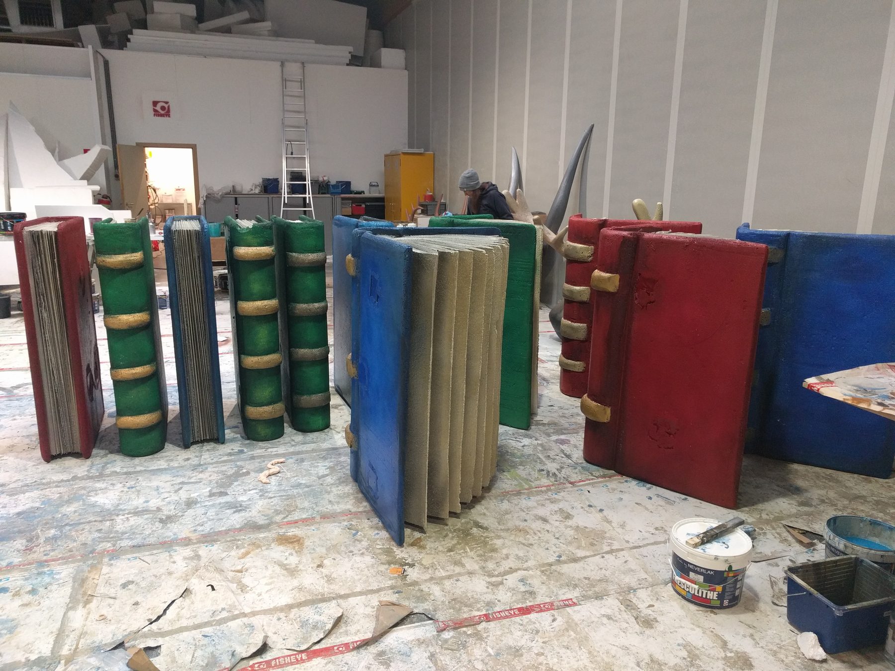 Large set-piece books under construction in the workshop