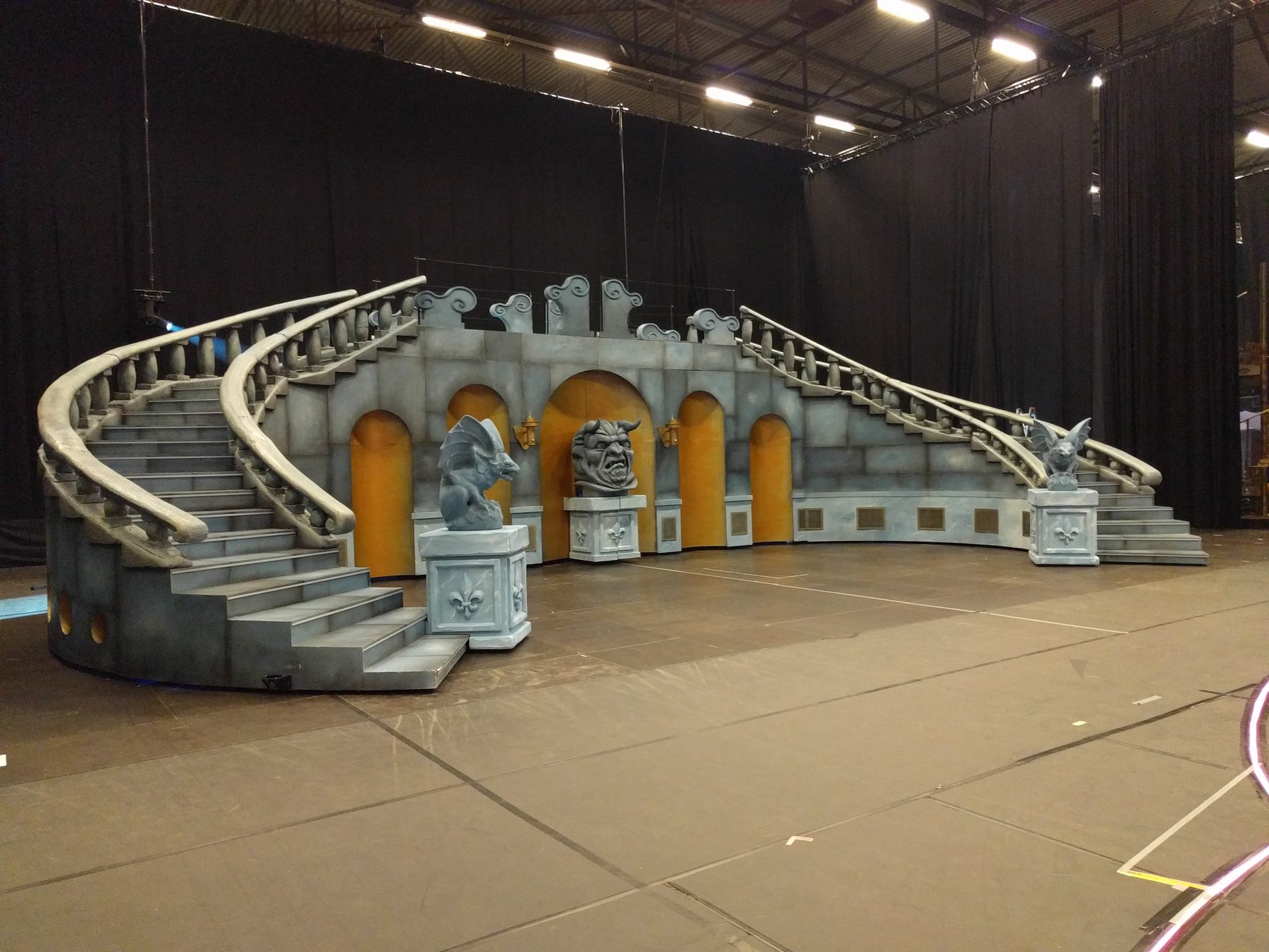 A finished staircase with statues as a set piece