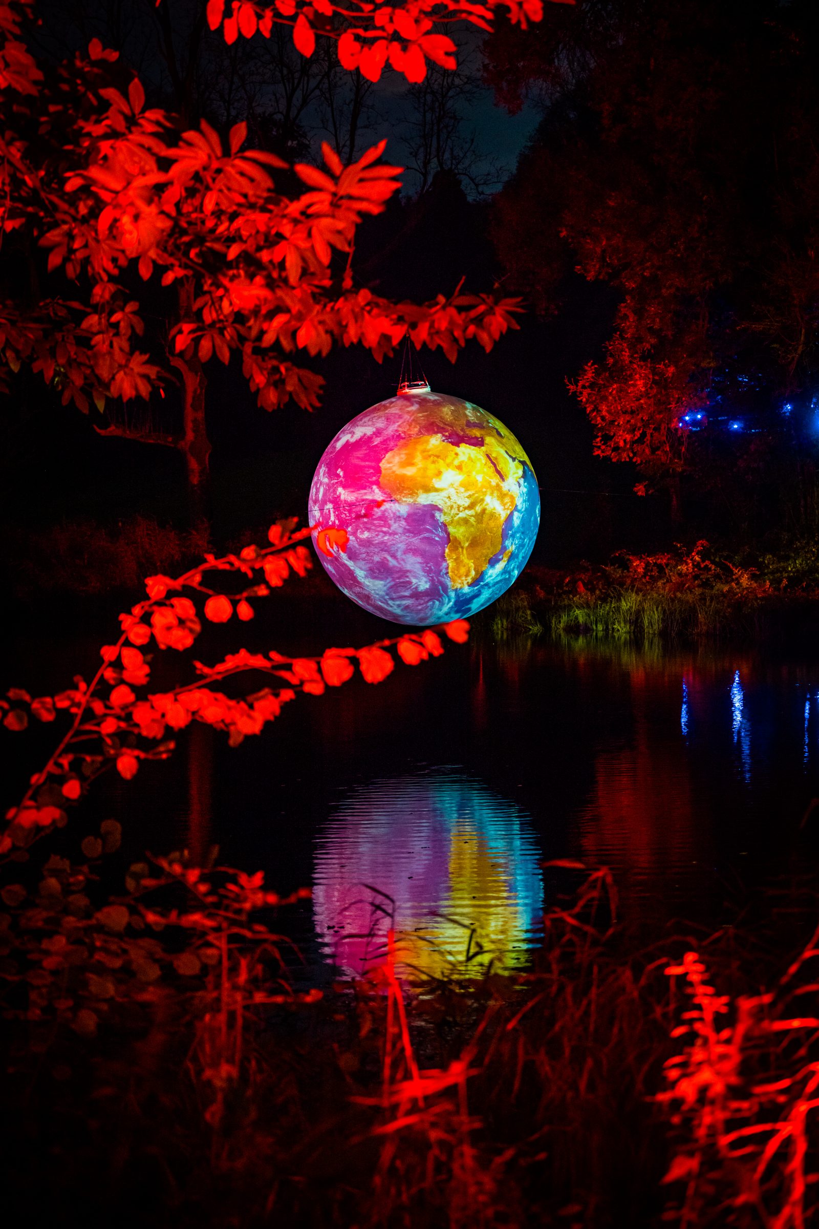 Lit globe above the water