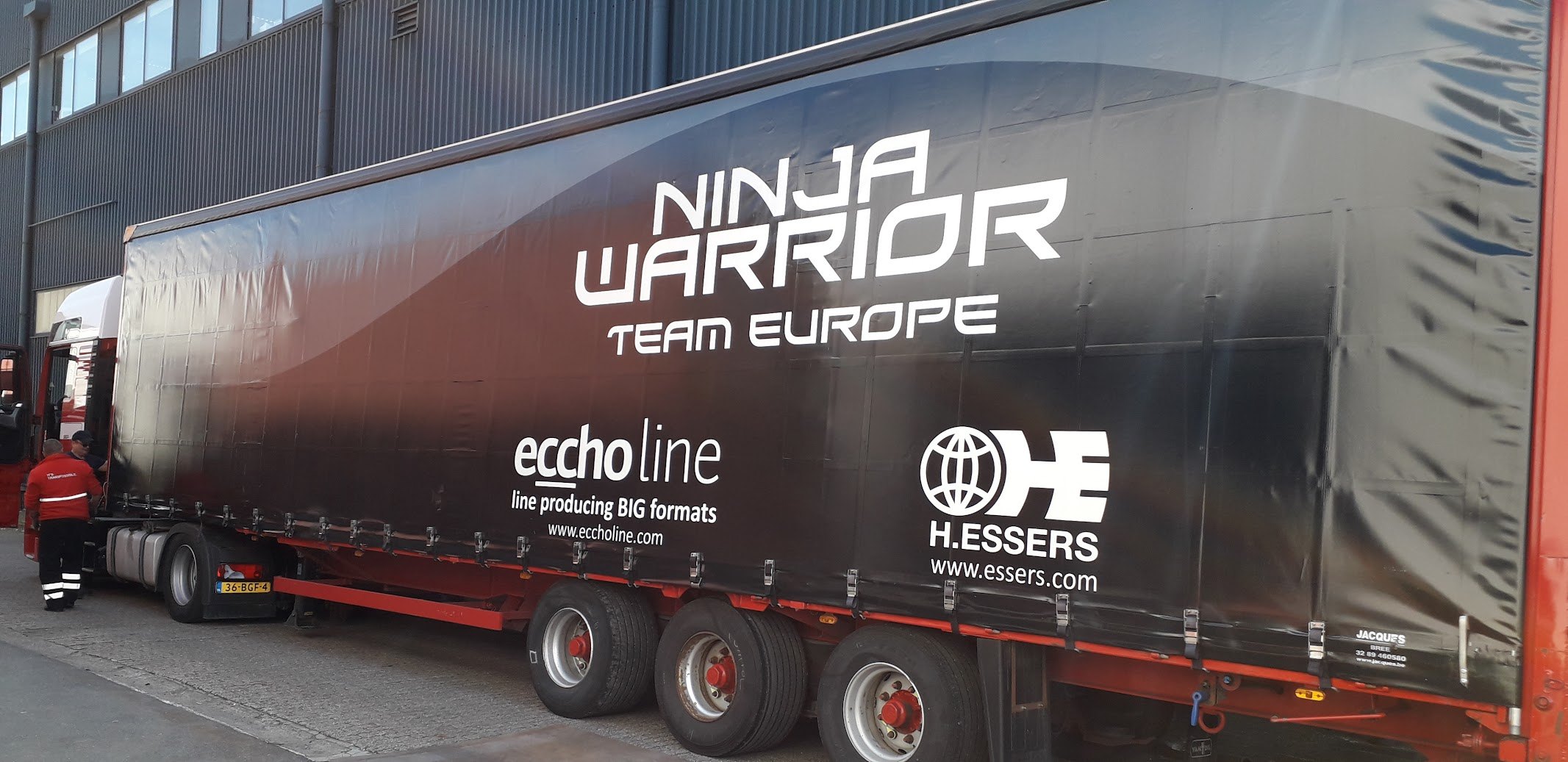 Trailer with Ninja Warrior livery being unloaded