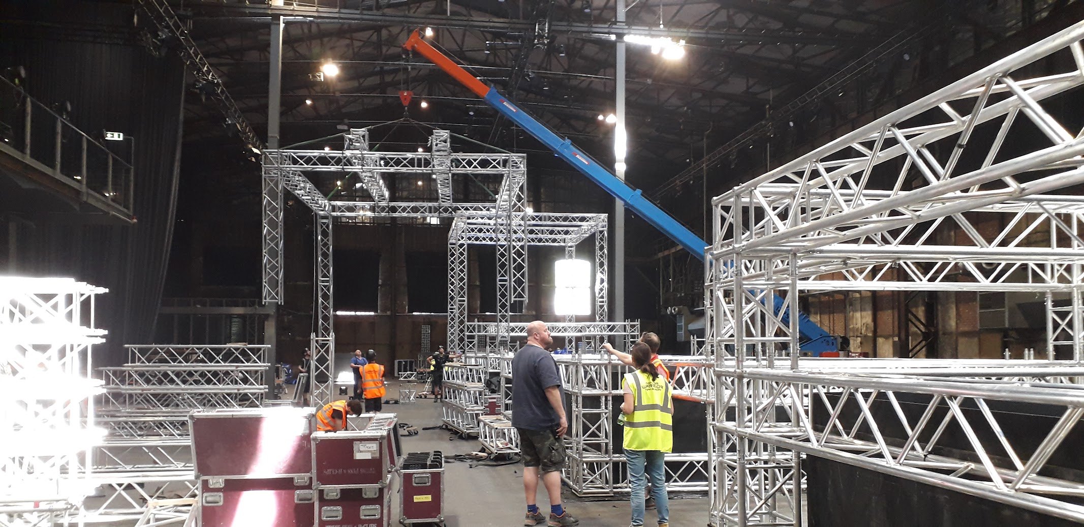 Truss structure under construction in a hall