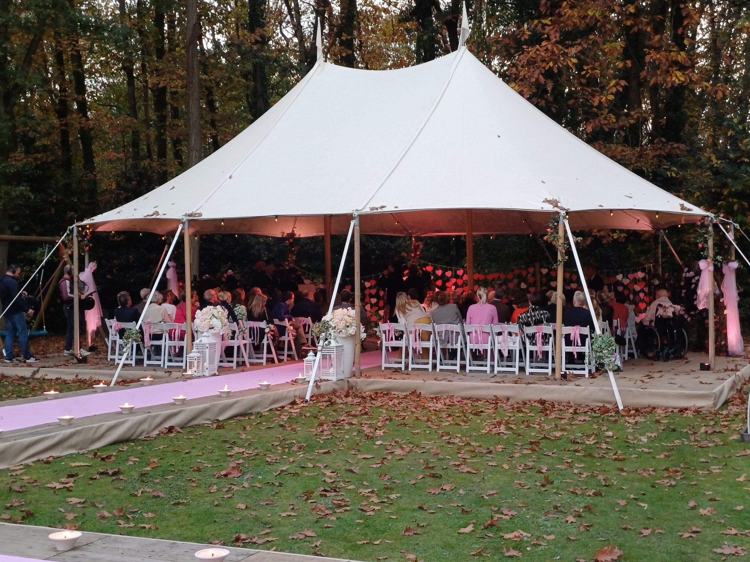 Droomfabriek: a ceremony under a tent in the woods