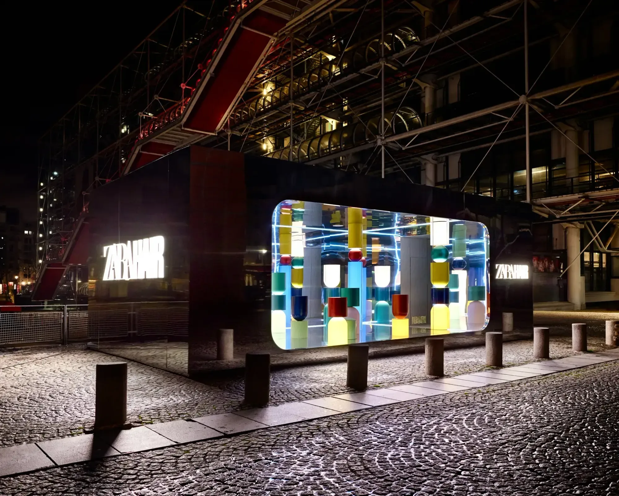 The mirrored volume on the square by day